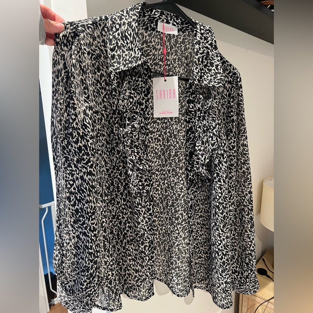 Never worn Savida button down long sleeved shirt